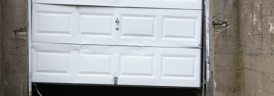 Garage Door Got Hit By A Car Dent Removal in Vaughan, ON