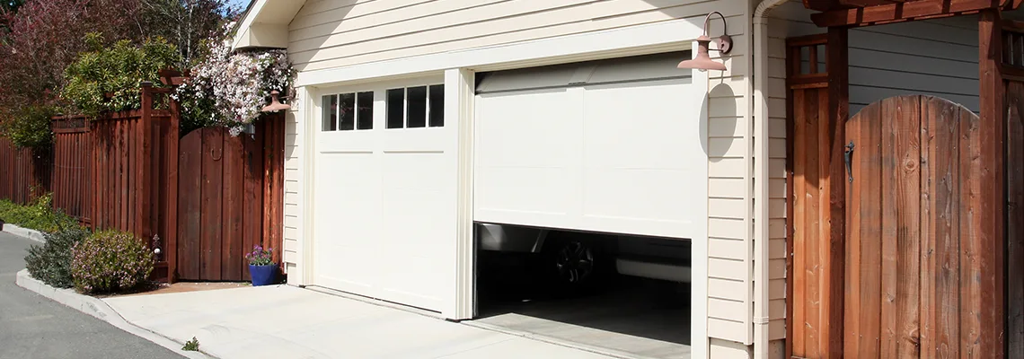 Fix Metal Garage Door Jerking in Vaughan, Ontario